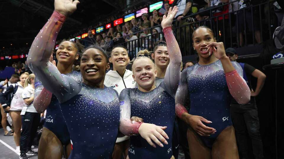 Team USA celebrates winning the gold medal during the women's team final at the Artistic Gymnastics World Championships in Antwerp, Belgium, Wednesday, Oct. 4, 2023. (AP Photo/Geert vanden Wijngaert)
