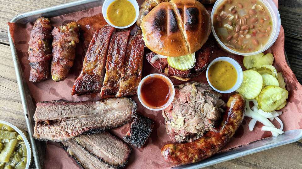 Brisket, green beans, stuffed jalapenos, pork ribs, smoked boudin, pinto beans, smoked bologna sandwich, pulled pork and jalapeno & cheese sausage at Rosemeyer Bar-B-Q in Spring