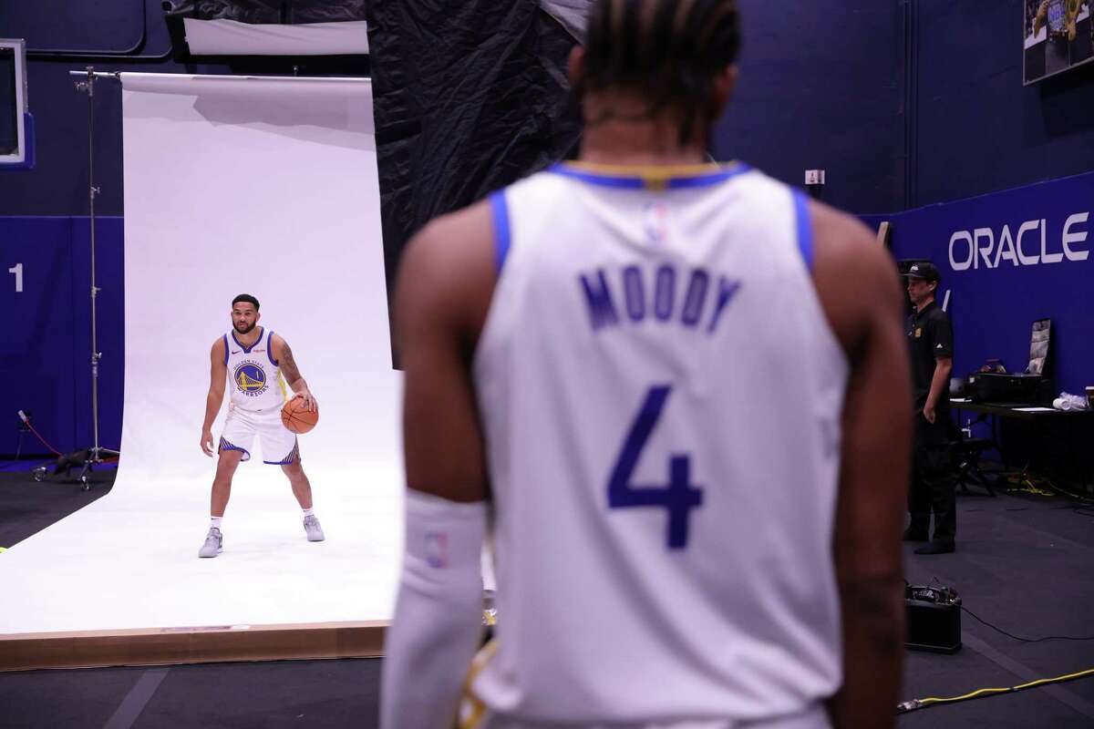 Golden State Warriors' Team members pose during media day Monday