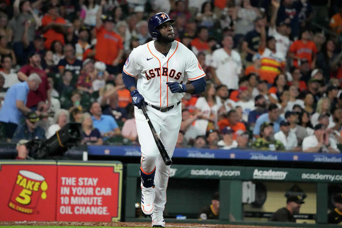 Houston Astros center fielder Jake Meyers signs an autograph after the  team's 7-5 win over