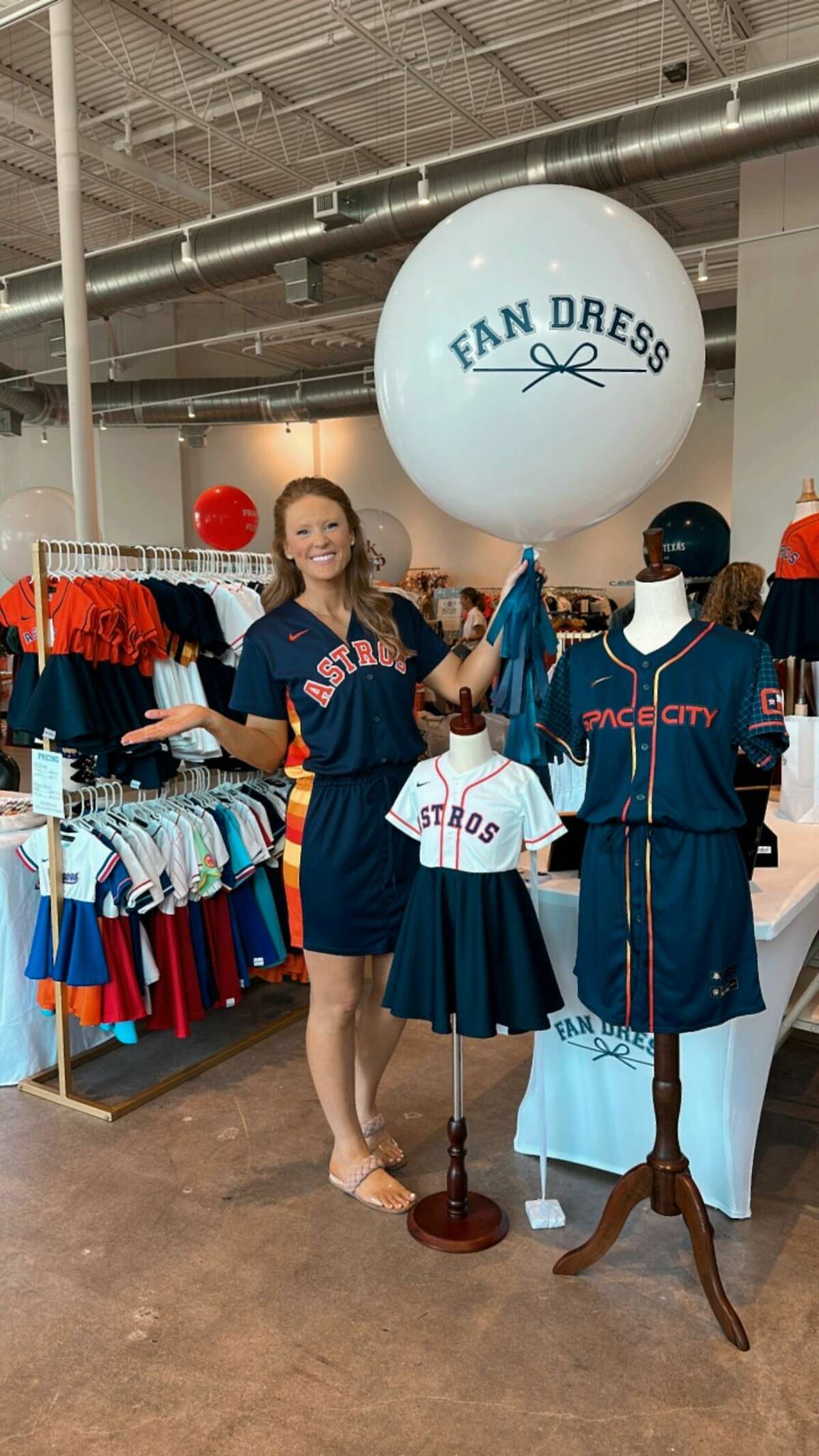 Families of Astros players wear custom dresses made by Woodlands mom
