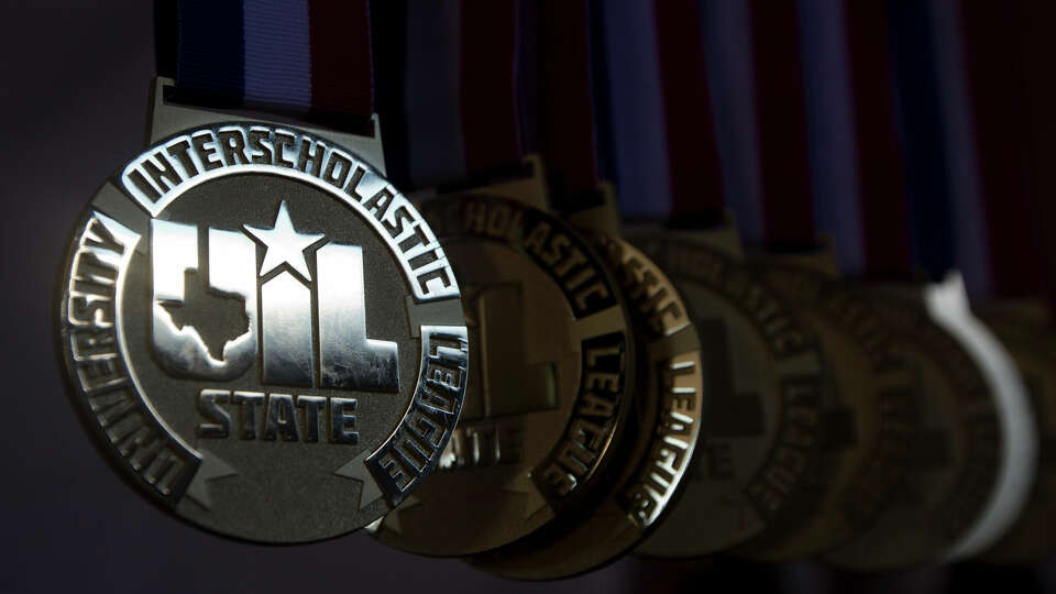 Medals hang during the UIL State Cross Country Championships at Old Settlers Park, Saturday, Nov. 9, 2019, in Round Rock.