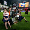 Families of Astros players wear custom dresses made by Woodlands mom