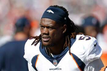 Denver Broncos linebacker Randy Gregory (5) charges the line