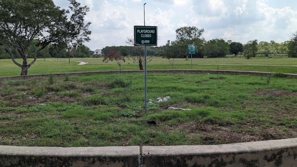 At Margaret Jenkins Park, a playground with no equipment is closed.