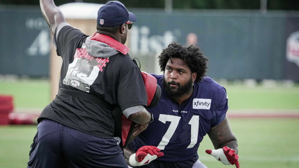 Houston Texans offensive tackle Tytus Howard (71) works on blocking drills during an NFL training camp Saturday, Aug. 5, 2023, in Houston.