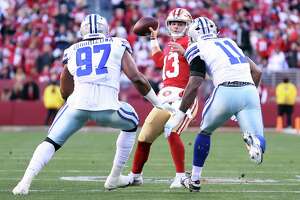 49ers' Brock Purdy flirts with passing perfection to beat Cardinals