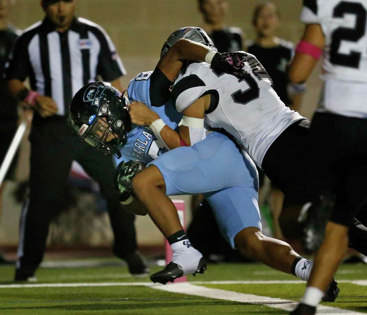 Harlan seals OT win over Sotomayor with clutch interception