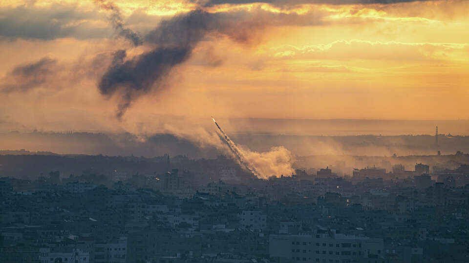 Rockets are fired toward Israel from the Gaza Strip, Saturday, Oct. 7, 2023. The rockets were fired as Hamas announced a new operation against Israel. (AP Photo/Fatima Shbair)