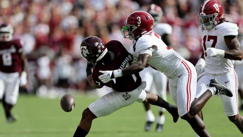 Terrion Arnold #3 of the Alabama Crimson Tide defends a pass intended for Moose Muhammad III #7 of the Texas A&M Aggies in the first half at Kyle Field on October 07, 2023 in College Station, Texas. (Photo by Tim Warner/Getty Images)