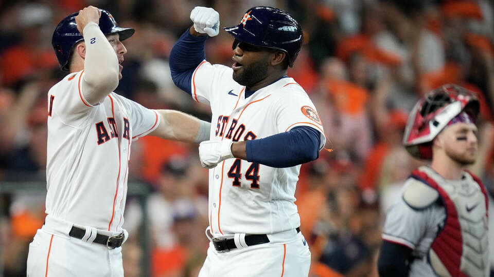 Houston Astros designated hitter Yordan Alvarez (44) celebrates with third baseman Alex Bregman (2) after he hit a two-run home run during the third inning of game one of the American League Division Series at Minute Maid Park on Saturday, Oct. 7, 2023, in Houston.