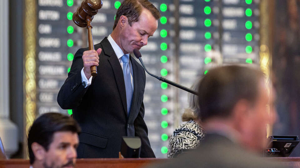 Texas House speaker Dade Phelan raises the gavel Monday, Oct. 9, 2023, on the House floor in the Capitol in Austin as he convenes the chamber for its third special session this year.