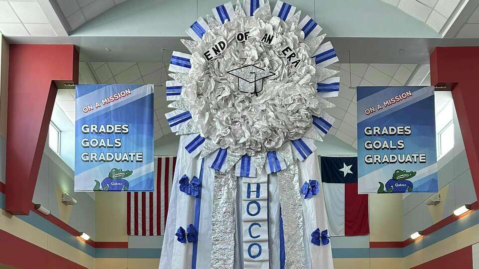 Dickinson High School students and staff created a 28-foot tall mum for homecoming.