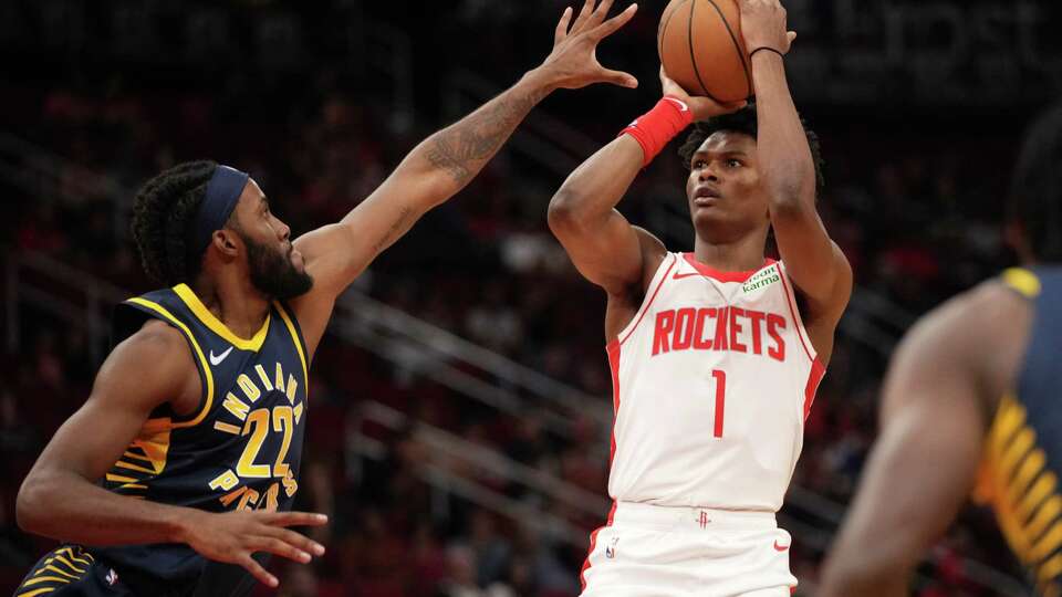 Houston Rockets forward Amen Thompson (1) shoots over Indiana Pacers forward Isaiah Jackson (22) during the first half of a pre-season NBA game Tuesday, Oct. 10, 2023, at the Toyota Center in Houston.