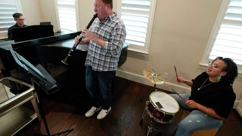 Matthew Kent Everett, left, Michael Woods, and Zecqureia Johnson play a musical composition by Astor Pantaleón Piazzolla as they rehearse for a future performance by The Woodlands Diversion on Wednesday, Oct. 11, 2023 in The Woodlands. The group's first exhibition, 