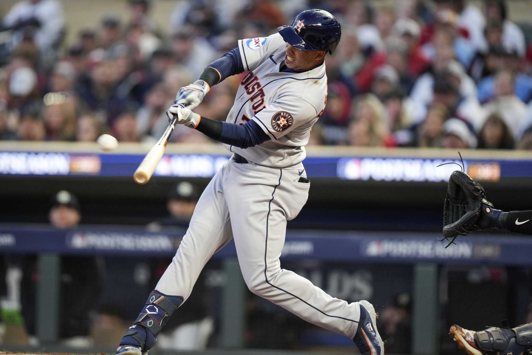 Texas Rangers designated hitter Brad Miller hits a line drive into a double  play against the Minnesota Twins during the ninth inning of a baseball  game, Friday, August 19, 2022, in Minneapolis.