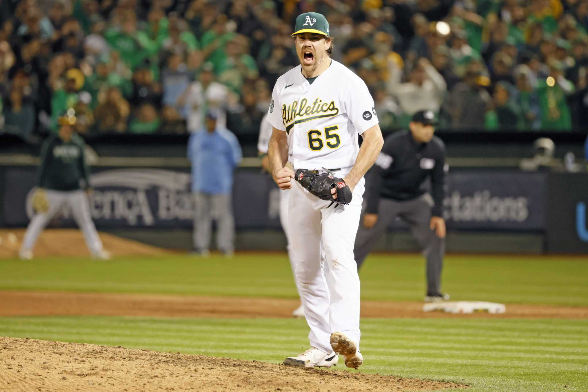 Trevor May is retiring from the A’s, and shortstop John Fisher is retiring