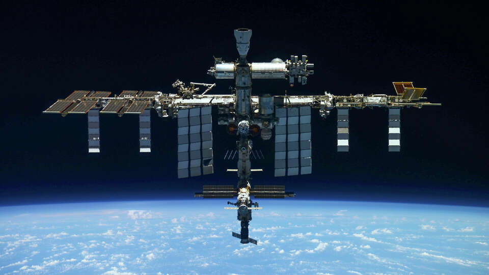 In this handout photo released by Roscosmos Space Agency Press Service, a view of the International Space Station taken on March 30, 2022 by crew of Russian Soyuz MS-19 spacecraft after undocking from the station. (Roscosmos Space Agency Press Service via AP, File)