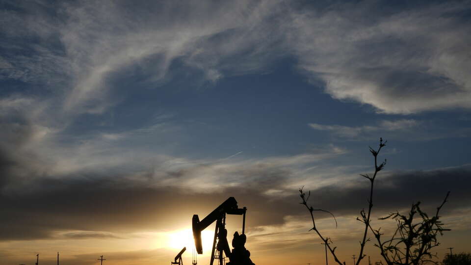 Pump jacks working on the Permian Basin near Odessa. The sun will set earlier in the evening after Nov. 5 as daylight savings time ends.