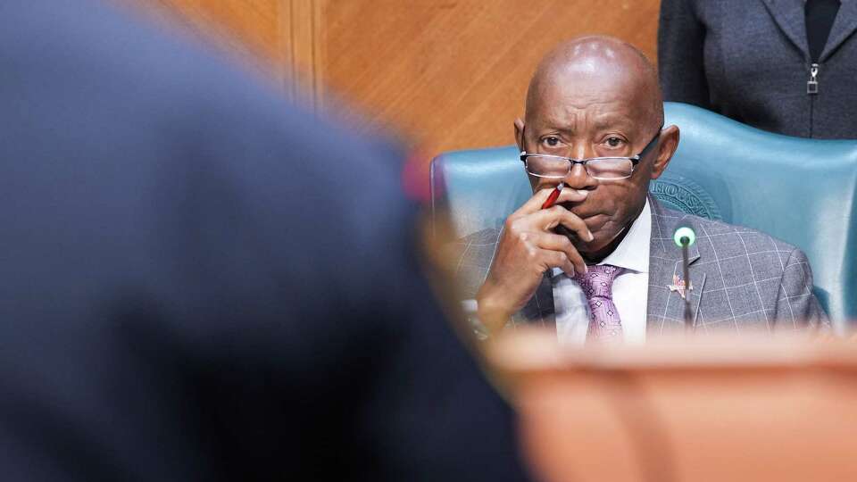 Houston Mayor Sylvester Turner listens to Houston Police Dept. Chief Troy Finner as he addresses the Houston City Council on the latest HPD statistics on Wednesday, Oct. 18, 2023 in Houston.