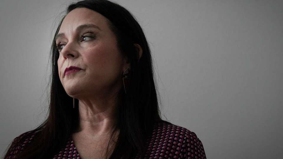 Shannon Lockhart cries as she talks about the death of her brother Stephen on Friday, Oct. 13, 2023, at her apartment in Conroe.