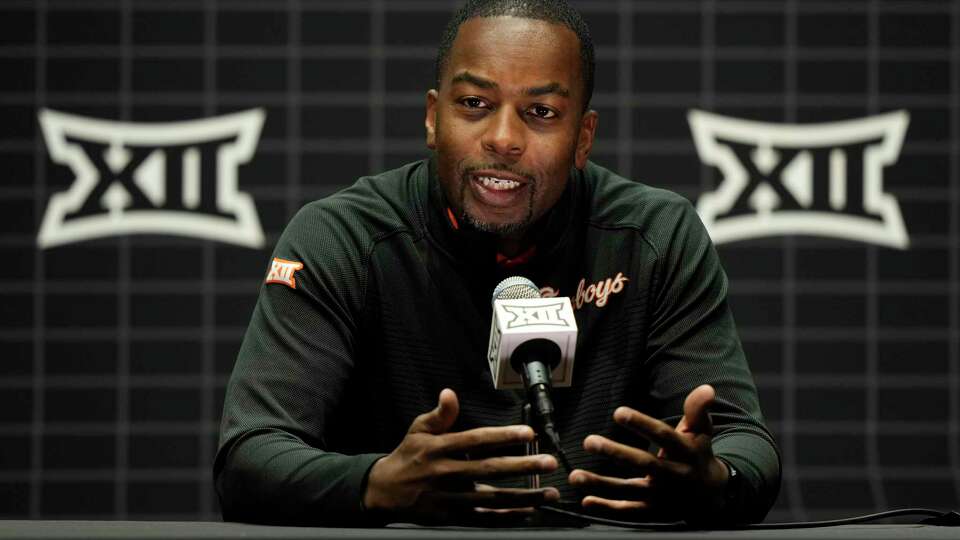 Oklahoma State coach Mike Boynton addresses the media during the NCAA college Big 12 men's basketball media day Wednesday, Oct. 18, 2023, in Kansas City, Mo.