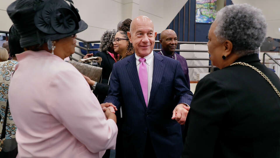 Houston mayoral candidate John Whitmire, center, talks with congregants after the morning services at the Galilee Missionary Baptist Church Sunday, Oct. 15, 2023 in Houston.