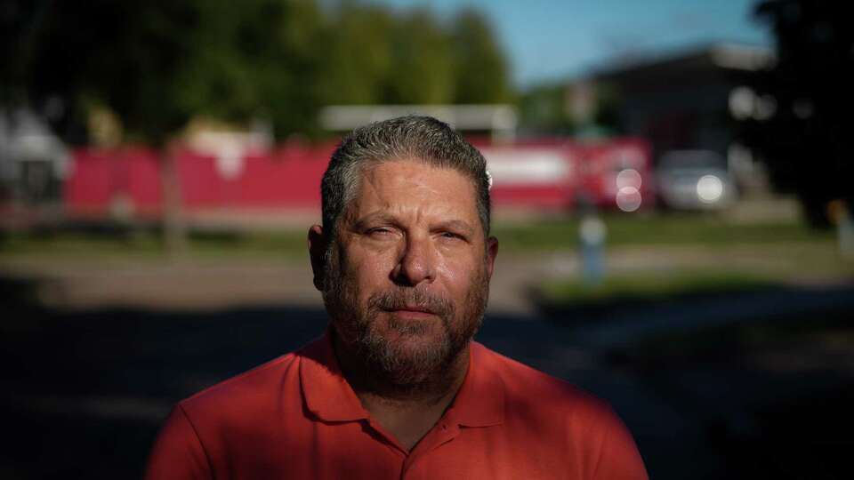 Brian Tucker, a special education teacher at Sugar Grove Academy Middle School, poses for a portrait Wednesday, Oct. 18, 2023, near the school in Houston. The school is an NES middle school in Houston Independent School District.