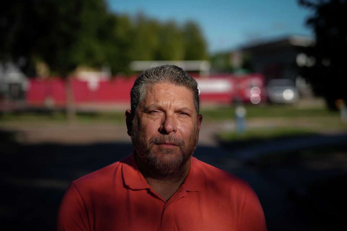 Brian Tucker, a special education teacher at Sugar Grove Academy Middle School, poses for a portrait Wednesday, Oct. 18, 2023, near the school in Houston. The school is an NES middle school in Houston Independent School District.