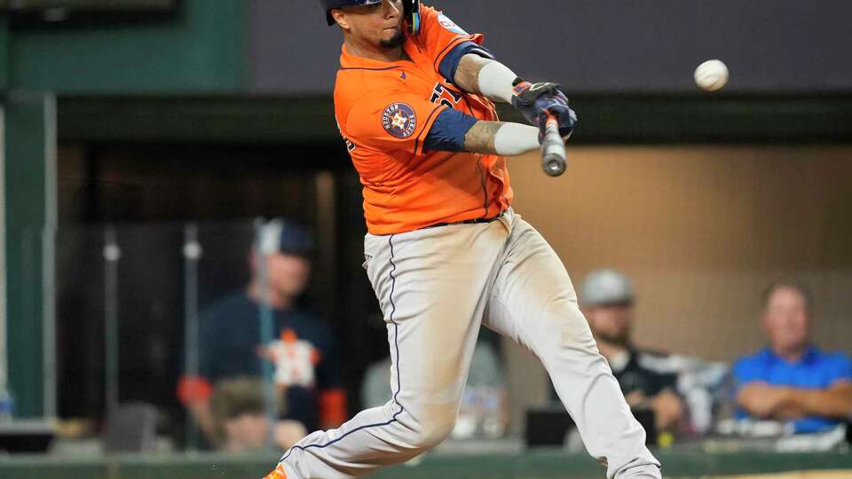 Houston Astros Martin Maldonado (15) hits a single during the seventh inning of Game 3 of the American League Championship Series at Globe Life Field on Wednesday, Oct. 18, 2023, in Arlington.