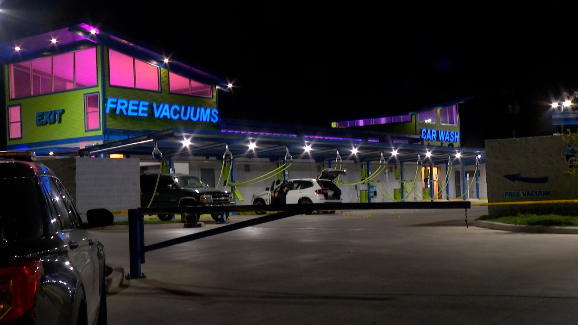 Police searching for gunmen who killed woman at car wash