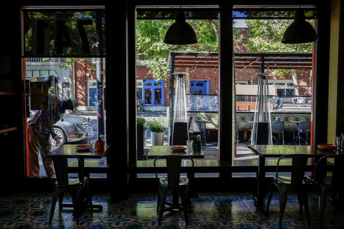 Summer shade. Outdoor dining is - South Coast Plaza