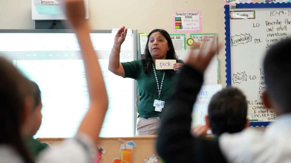 A first-grade Dual Language program teacher is teaching in English on Thursday, Oct. 19, 2023 at Patterson Elementary School in Houston.