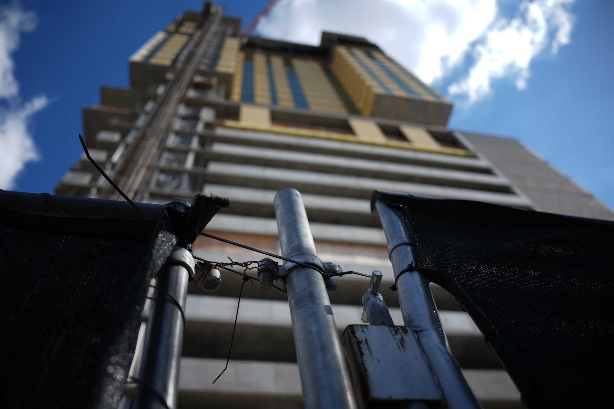 X Houston co-living skyscraper construction stalled in Museum District