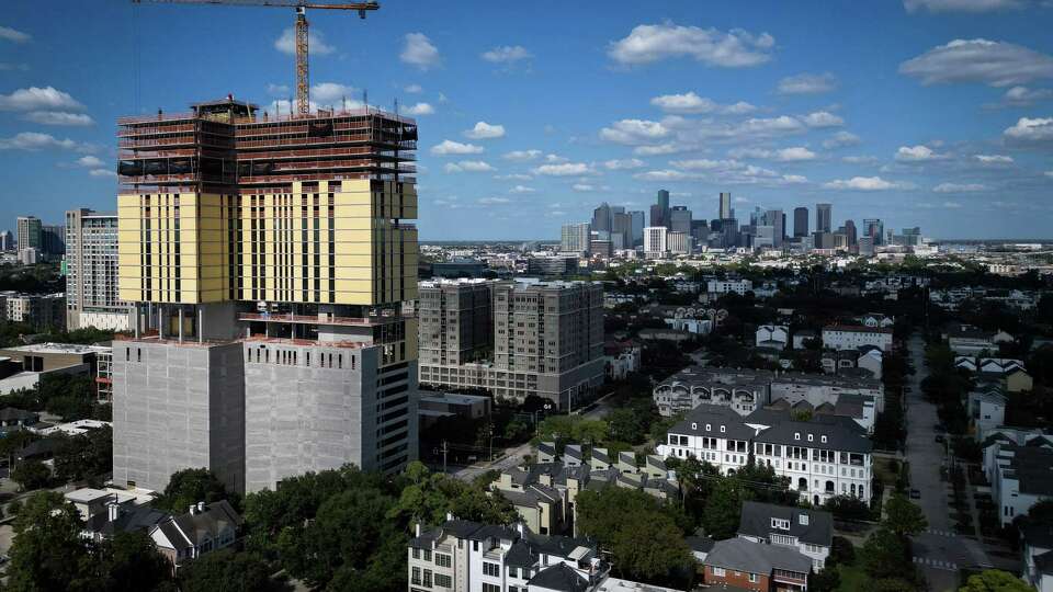 Work appears to be stopped on a high-rise building Wednesday, Oct. 18, 2023, in Houston.