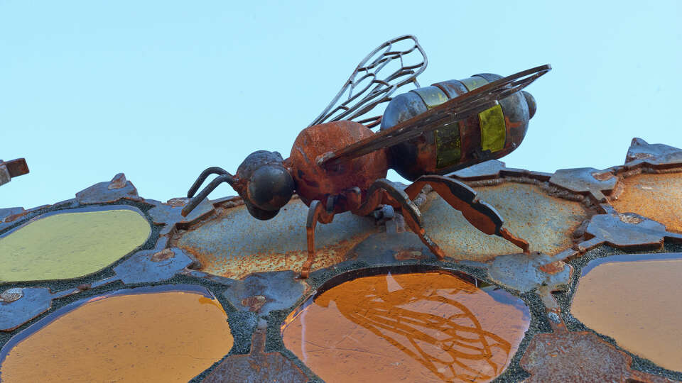 Bee on Beehive, one of Glass in Flight's sculptures on display at Houston Botanic Garden.  