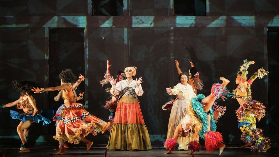 J'Nai Bridges, center, and Janai Brugger, right center, are surrounded by Urban Bush Women Dancers in 