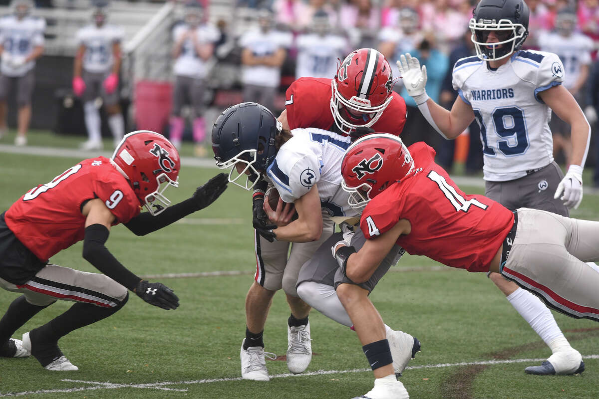 New Canaan High School football survives Wilton in overtime.