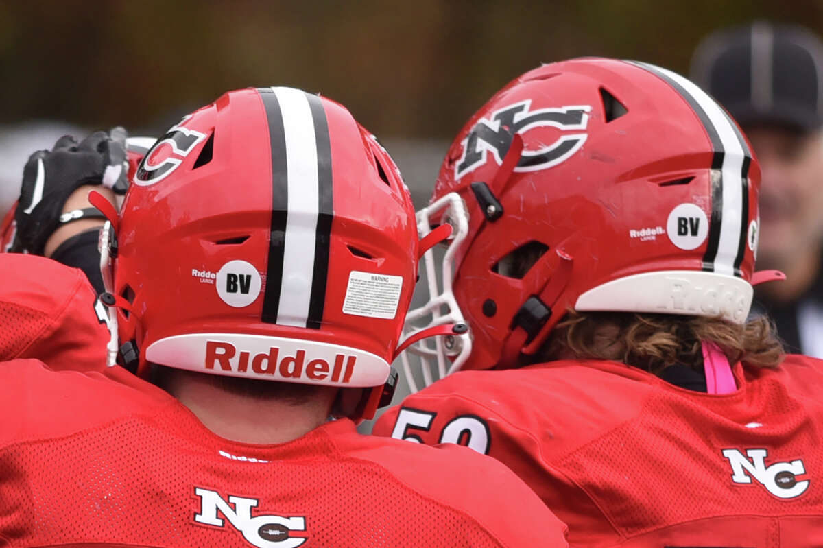 New Canaan High School football survives Wilton in overtime.