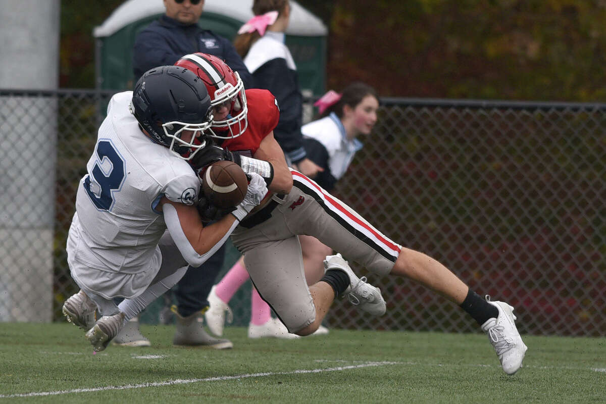 New Canaan High School football survives Wilton in overtime.