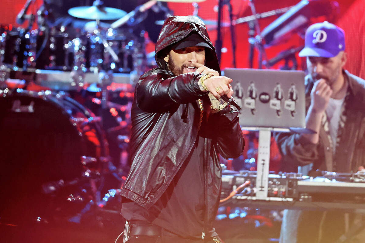 This 2022 photo shows Eminem performing onstage during the 37th Annual Rock & Roll Hall of Fame Induction Ceremony at Microsoft Theater in California. With over 25 records under his belt, including the fastest rap in a hit single and the most words in a hit single, the Detroit hip-hop star certainly isn't a stranger to Guinness World Records.