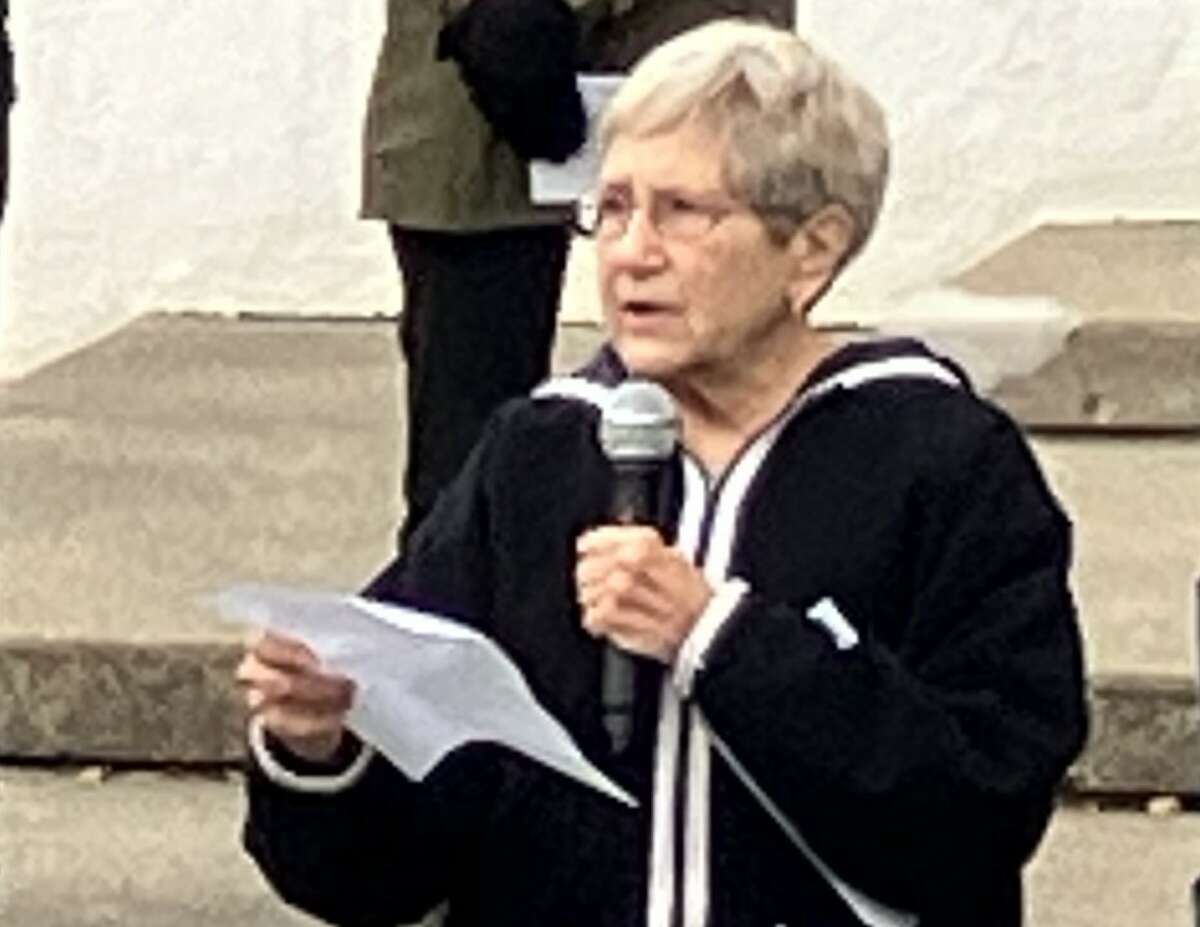 Beth Cook of Temple Beth Israel in Bay City was one of four speakers from various congregations who spoke Monday night at a candlelight vigil held in Central Park to express sympathy for the many lives lost recently in Israel and Gaza and to pray for peace.