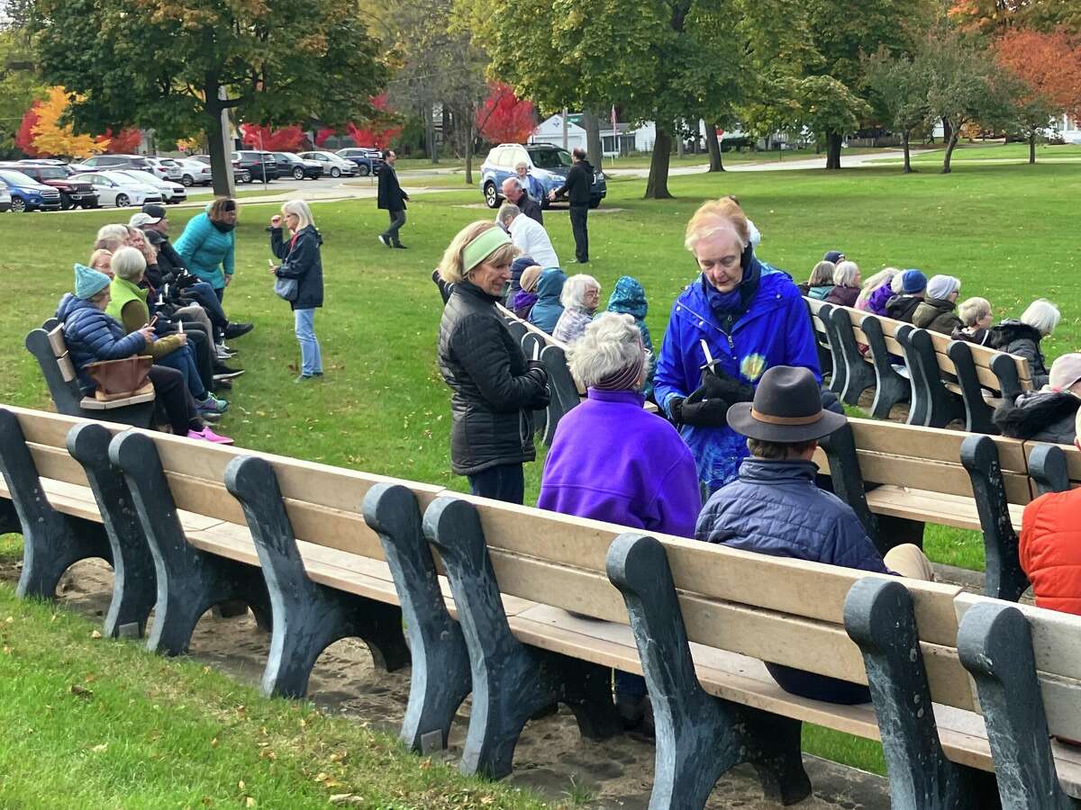 People gather for a candlelight vigil in Central Park Monday evening to express sympathy for the many lives lost recently in Israel and Gaza.