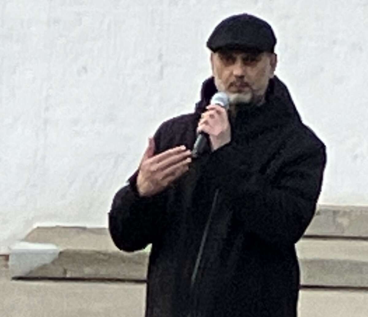 Dr. Naveed Khan of the Islamic Center of Midland was one of four speakers from various congregations who spoke Monday night at a candlelight vigil held in Central Park to express sympathy for the many lives lost recently in Israel and Gaza and to pray for peace.
