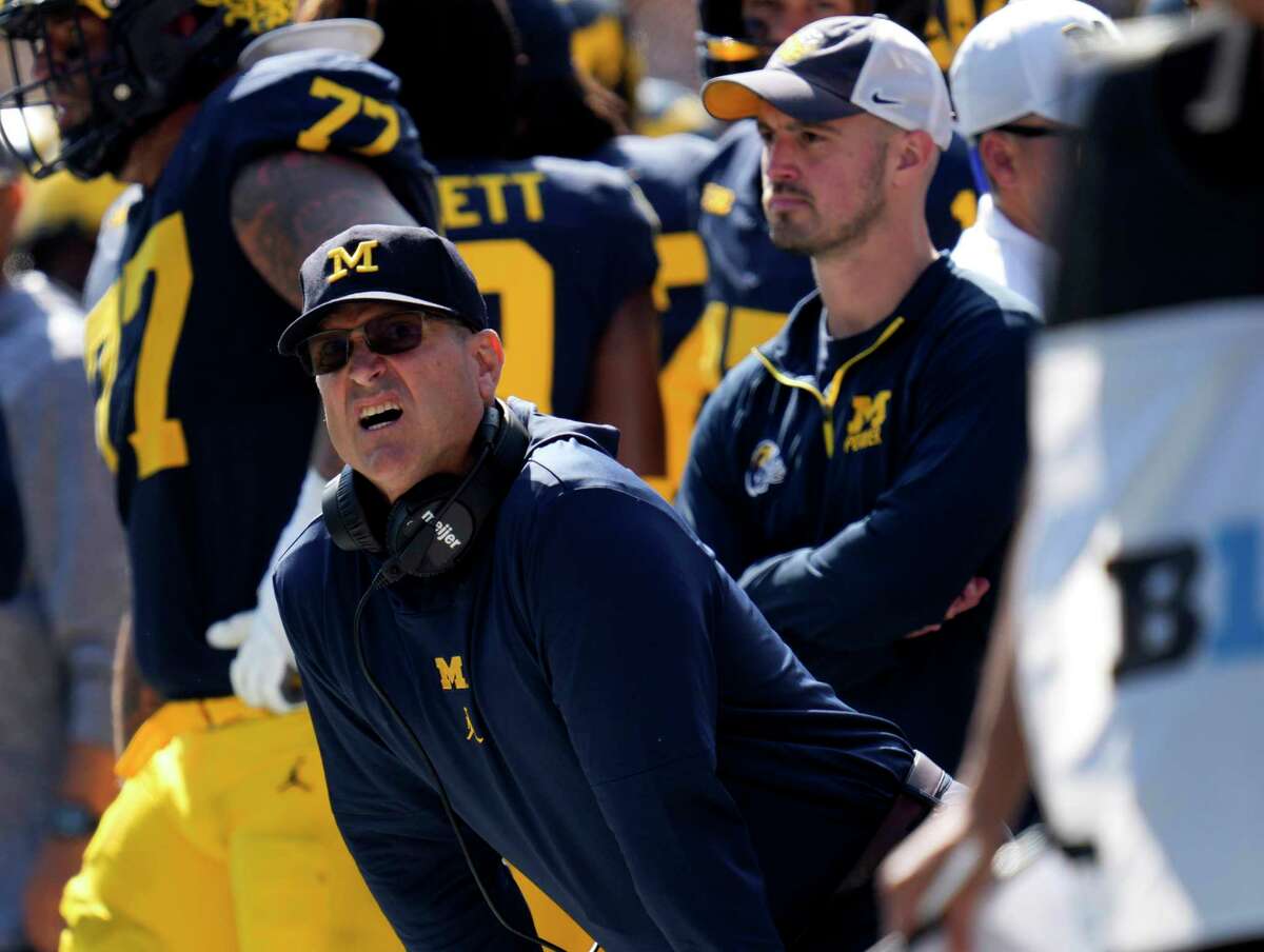 Coach Jim Harbaugh banned from 3 games over signstealing allegations