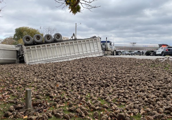 Two hurt when pickup collides with beet hauler