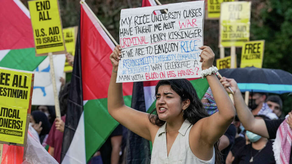 Student Lucia Fernandez joins over a hundred people and the 'Students for Justice in Palestine' to protest the Baker Institute's 30th Anniversary Gala at Rice University on Thursday, Oct. 26, 2023, in Spring.