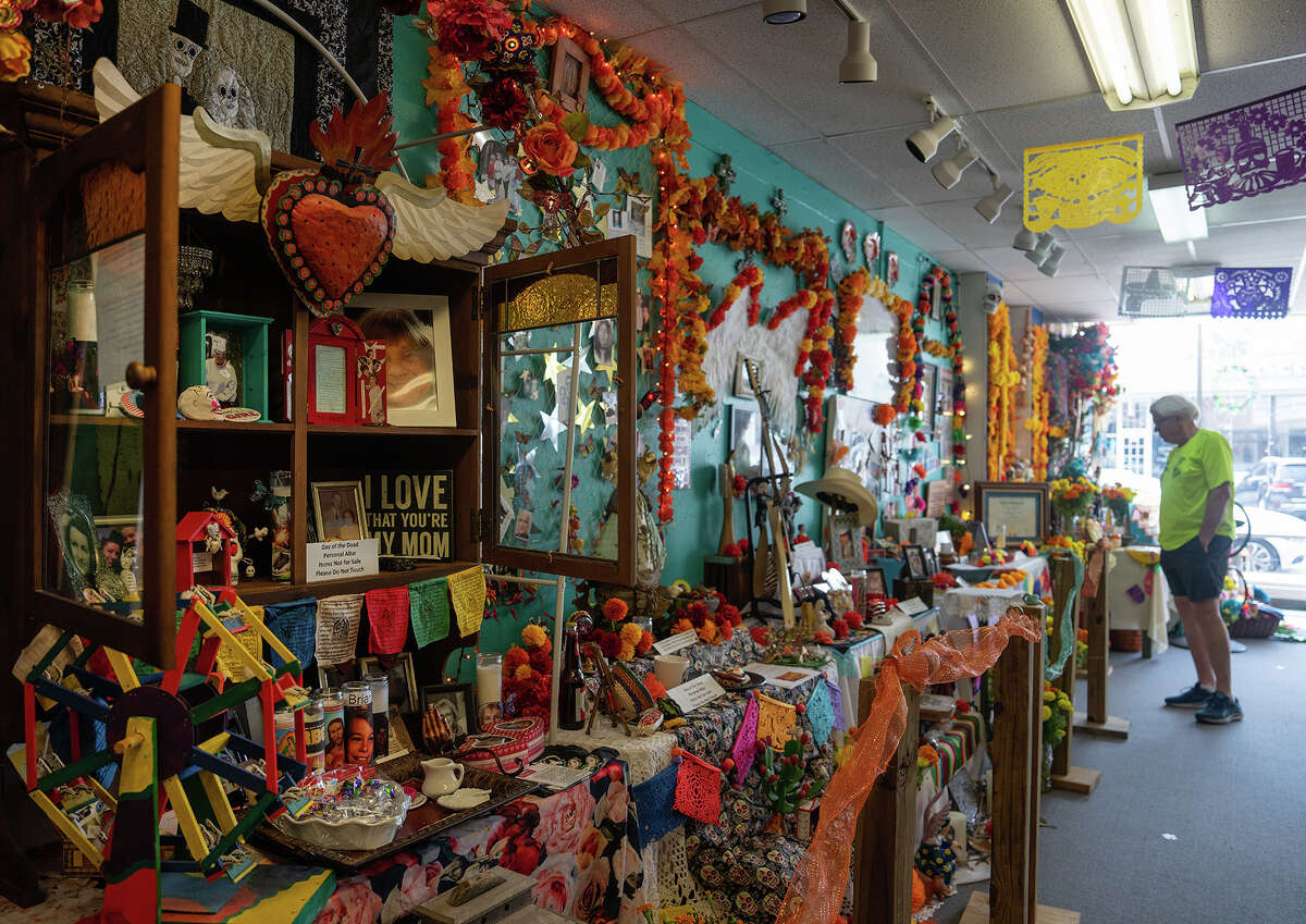 Casa Ramirez, a Mexican folk art store in the Heights is home to several ofrendas assembled by community members. More than three years after Macario Ramirez’s passing, his wife, Chrissie Dickerson Ramirez, is keeping his life-long work alive. 