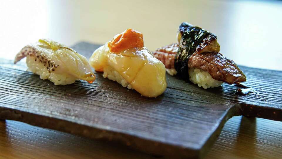 Nigiri & Sashimi: (l-r) Akamutsu (sea perch); Hotate & Uni (Hokkaido scallop and Hokkaido sea urchin); and Wagyu with Foie at Katami on Wednesday, Nov. 1, 2023, in Houston. Katami is Manabu Horiuchi's follow-up restaurant Kata Robata, one of the most popular sushi spots in Houston since it opened 14 years ago.