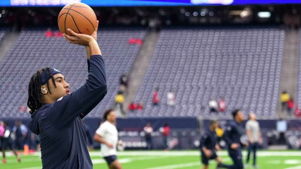 Houston Texans quarterback C.J. Stroud warms up before an NFL football game against the Tampa Bay Buccaneers on Sunday, Nov. 5, 2023, in Houston.